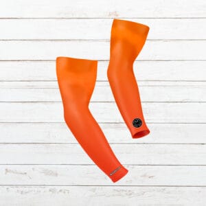 manguito tecnico running smile naranja elartedecorrer